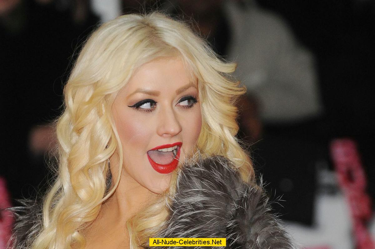 Christina Aguilera Shows Deep Cleavage At Burlesque British Gala