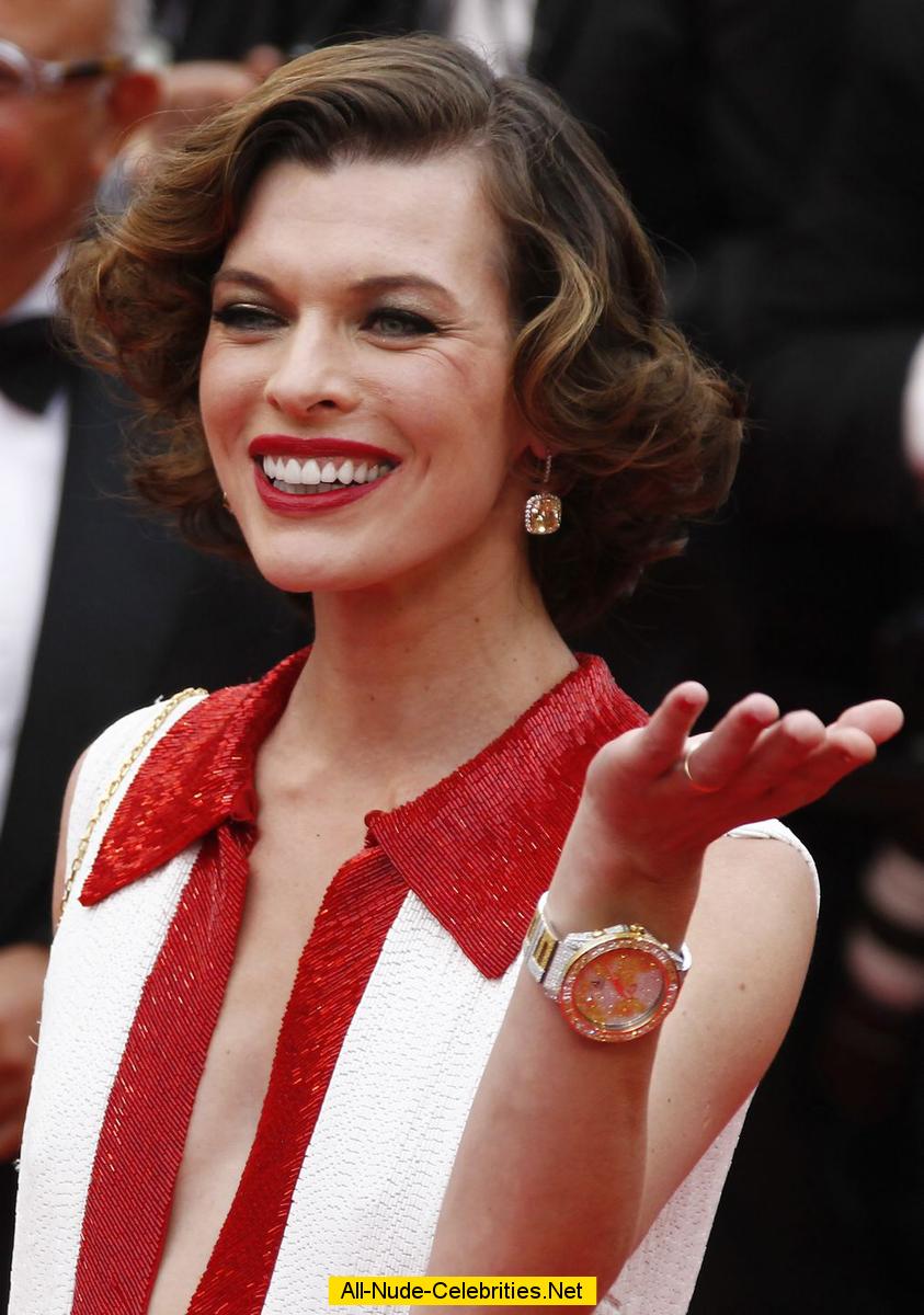 Milla Jovovich posing for paparazzi at Cannes Film Festival 2011